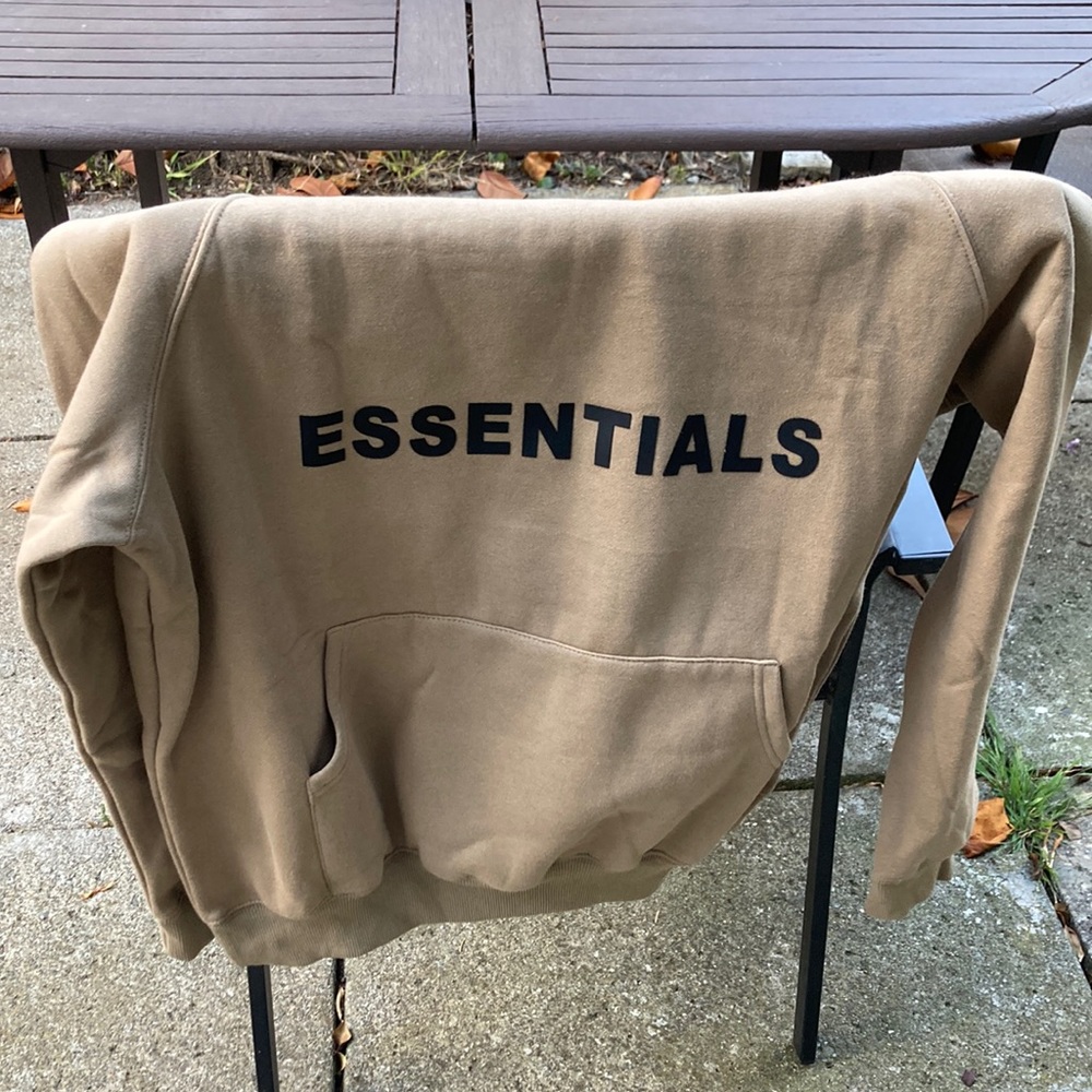 Brand new never worn essentials sweatshirt